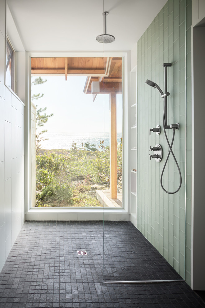 Design ideas for a large contemporary ensuite bathroom in Portland Maine with flat-panel cabinets, green cabinets, a built-in shower, a wall mounted toilet, white tiles, porcelain tiles, white walls, slate flooring, a submerged sink and granite worktops.