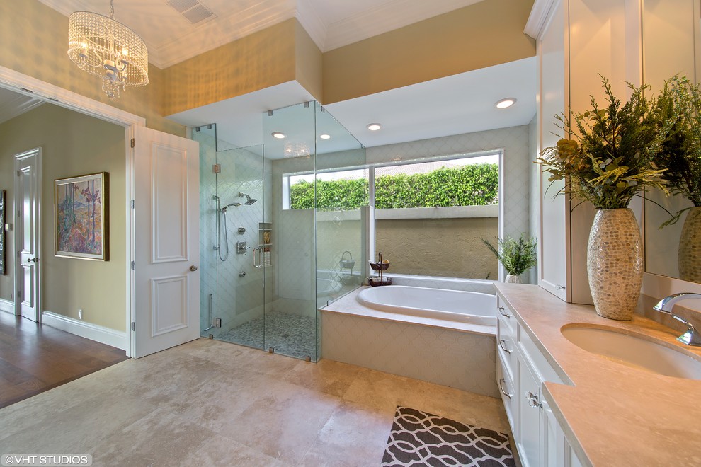 Inspiration for a mid-sized transitional master white tile and glass tile marble floor bathroom remodel in Miami with an undermount sink, recessed-panel cabinets, white cabinets, marble countertops, a bidet and brown walls