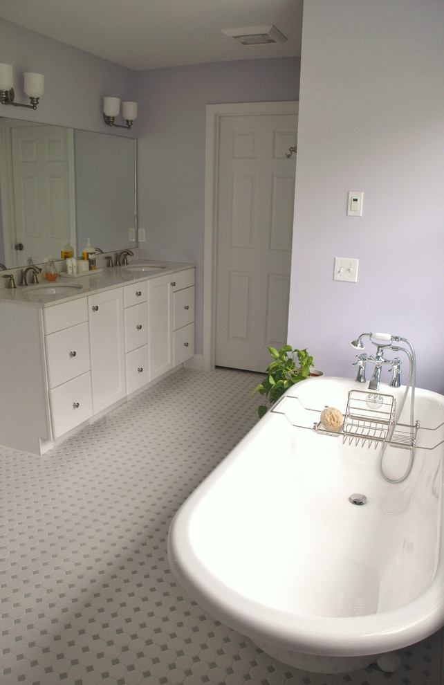 Bathroom - mid-sized transitional master white tile and ceramic tile ceramic tile bathroom idea in Burlington with an undermount sink, shaker cabinets, white cabinets, quartz countertops, a two-piece toilet and purple walls
