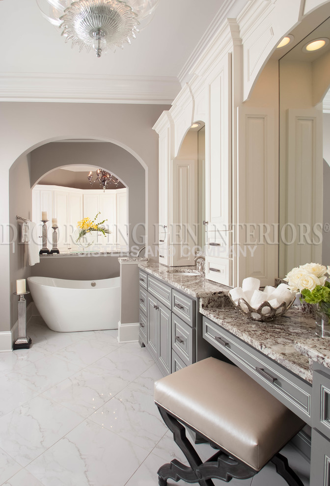 Exemple d'une salle de bain chic de taille moyenne avec des portes de placard grises, une baignoire indépendante, une douche ouverte, un carrelage blanc, des carreaux de béton, un mur gris, un lavabo encastré et un plan de toilette en granite.
