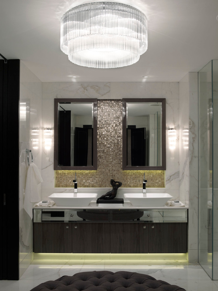 Photo of a contemporary bathroom in London with a freestanding bath.