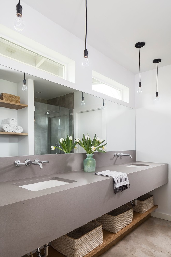 Photo of a large contemporary ensuite bathroom in Austin with grey tiles, porcelain tiles, white walls, concrete flooring, a submerged sink, engineered stone worktops, an alcove shower, grey floors and a hinged door.