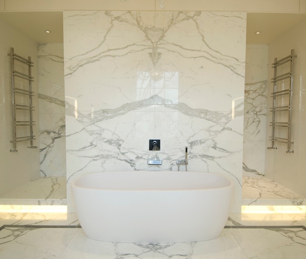 Bathroom - contemporary marble tile bathroom idea in London