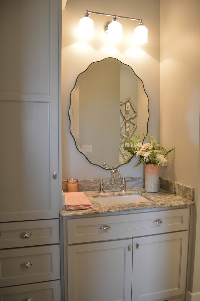 Mid-sized farmhouse kids' beige tile and ceramic tile ceramic tile bathroom photo in New Orleans with furniture-like cabinets, gray cabinets, a one-piece toilet, gray walls, an undermount sink and granite countertops