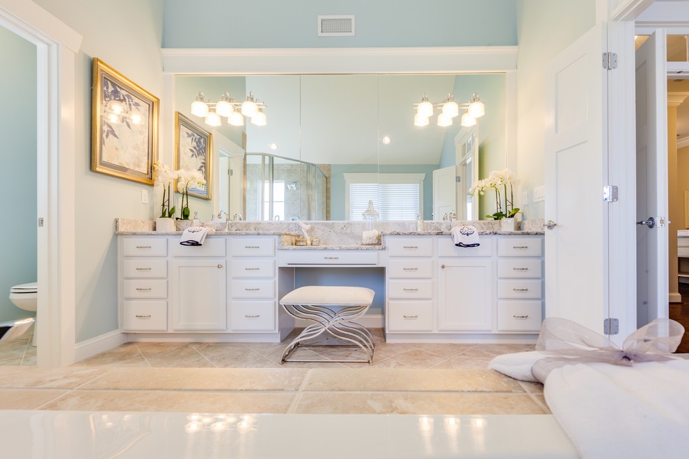 Example of a large beach style master beige tile and porcelain tile ceramic tile bathroom design in Other with an undermount sink, shaker cabinets, white cabinets, quartz countertops, a two-piece toilet and beige walls