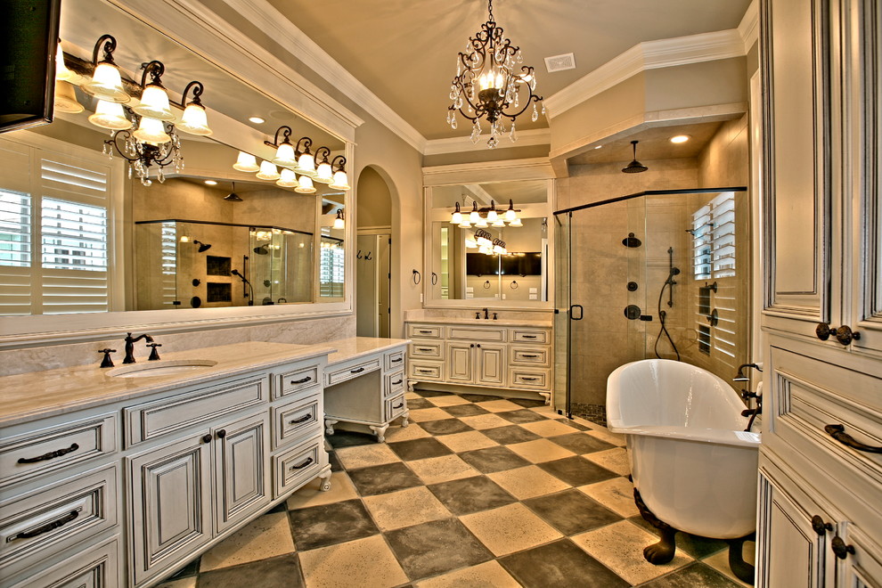 Photo of a medium sized classic ensuite bathroom in Dallas with a built-in sink, beaded cabinets, distressed cabinets, a freestanding bath, a corner shower, beige walls, granite worktops, multi-coloured tiles, ceramic tiles and ceramic flooring.