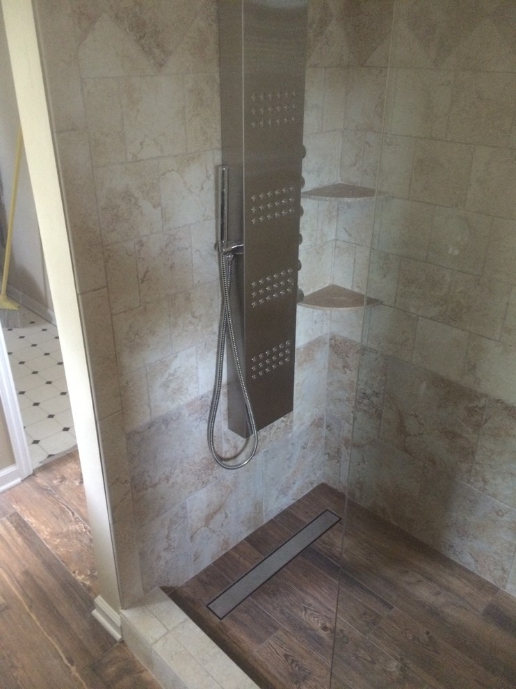 St. Simons shower with wood floor Contemporary Bathroom