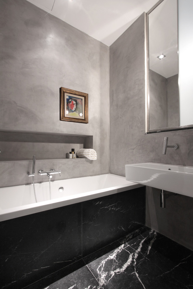 他の地域にあるコンテンポラリースタイルのおしゃれな浴室 (壁付け型シンク) の写真