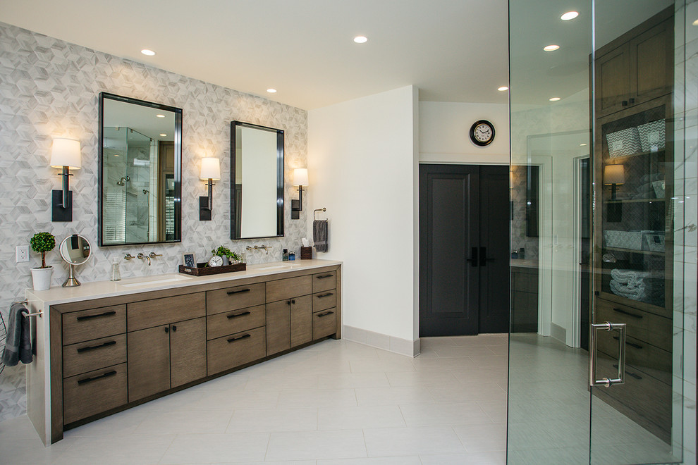 Photo of a large contemporary ensuite bathroom in Portland with flat-panel cabinets, brown cabinets, a japanese bath, a built-in shower, a two-piece toilet, white walls, a submerged sink, engineered stone worktops, grey floors, a hinged door, white worktops, double sinks and a built in vanity unit.