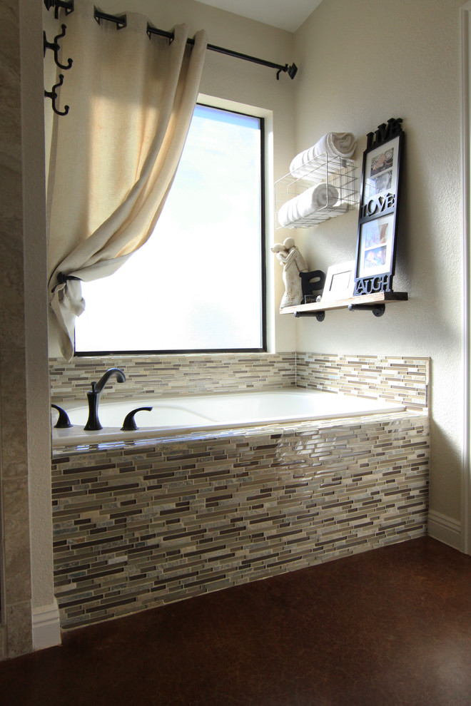Bathroom - mid-sized transitional master beige tile and glass tile concrete floor bathroom idea in Austin with shaker cabinets, white cabinets, beige walls, an undermount sink and granite countertops