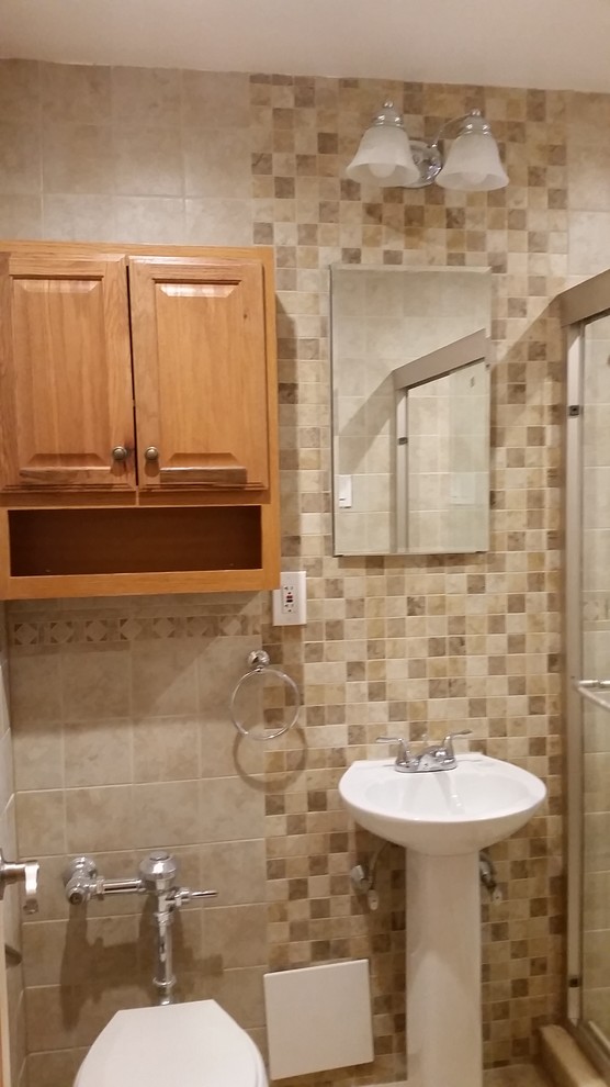 Small transitional master beige tile and porcelain tile porcelain tile and beige floor bathroom photo in New York with open cabinets, white cabinets, a two-piece toilet, beige walls and a pedestal sink