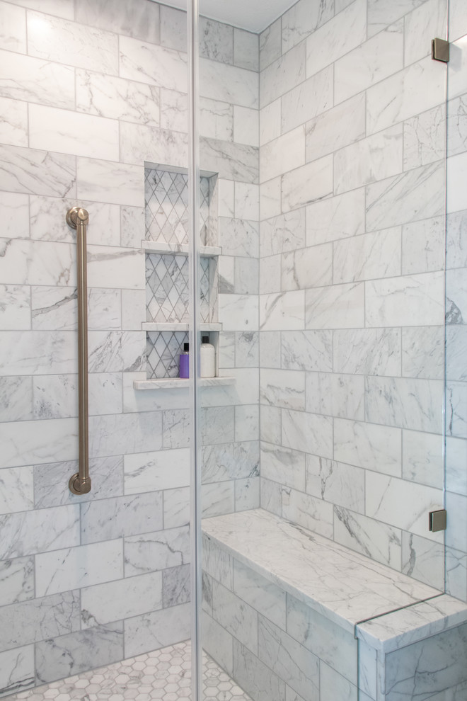 Large transitional master marble tile marble floor and white floor bathroom photo in Cleveland with a hinged shower door