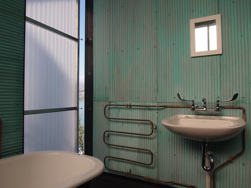Immagine di una piccola stanza da bagno padronale eclettica con pareti verdi