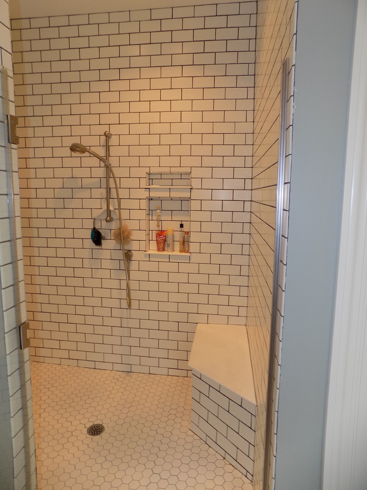 Example of a large trendy master white tile and porcelain tile porcelain tile bathroom design in Columbus with recessed-panel cabinets, white cabinets, a two-piece toilet, gray walls, an undermount sink and granite countertops