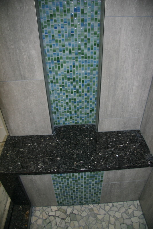 This is an example of a small contemporary bathroom in DC Metro.