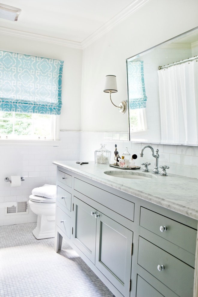Inspiration for a contemporary white tile bathroom remodel in Atlanta with an undermount sink, recessed-panel cabinets and gray cabinets