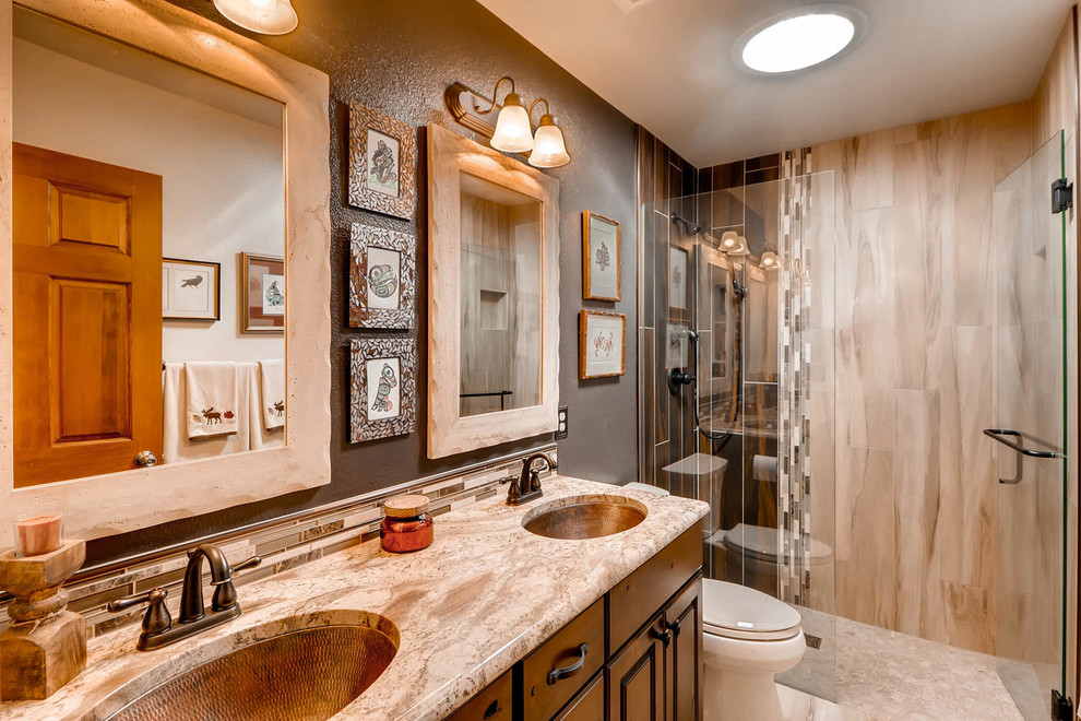 Mid-sized mountain style 3/4 multicolored tile and mosaic tile ceramic tile walk-in shower photo in Denver with flat-panel cabinets, medium tone wood cabinets, a two-piece toilet, beige walls, an undermount sink and quartz countertops