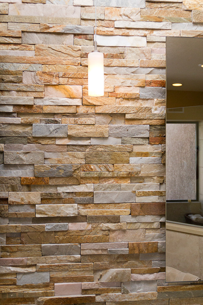 Inspiration for a mid-sized rustic master multicolored tile and stone tile porcelain tile walk-in shower remodel in Phoenix with raised-panel cabinets, medium tone wood cabinets, beige walls, quartz countertops and a trough sink