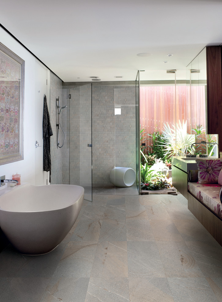Ejemplo de cuarto de baño actual con baldosas y/o azulejos grises, baldosas y/o azulejos de porcelana y suelo de baldosas de porcelana