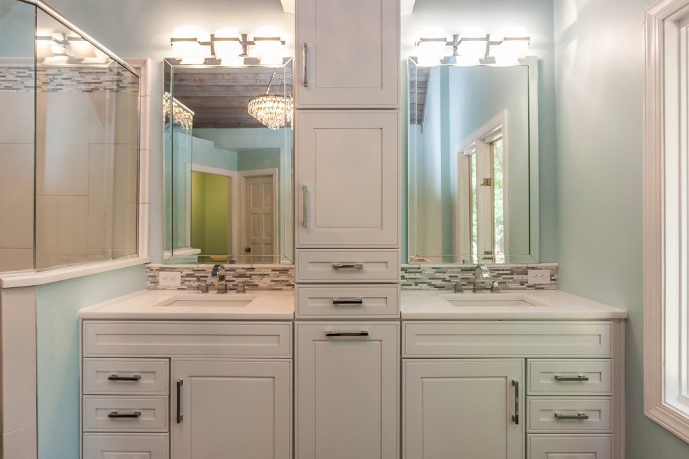 Large trendy master white tile and ceramic tile ceramic tile bathroom photo in Raleigh with shaker cabinets, white cabinets, a two-piece toilet, blue walls, an undermount sink and quartzite countertops