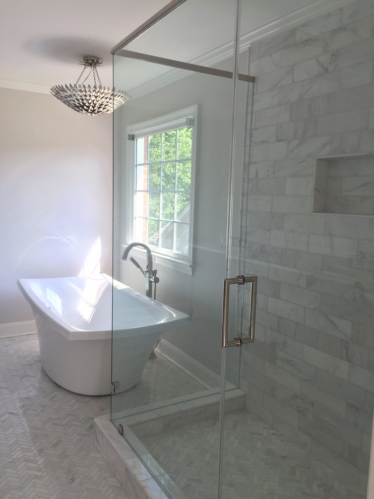 Large transitional master white tile and mosaic tile marble floor bathroom photo in Raleigh with an undermount sink, recessed-panel cabinets, gray cabinets, quartz countertops and gray walls
