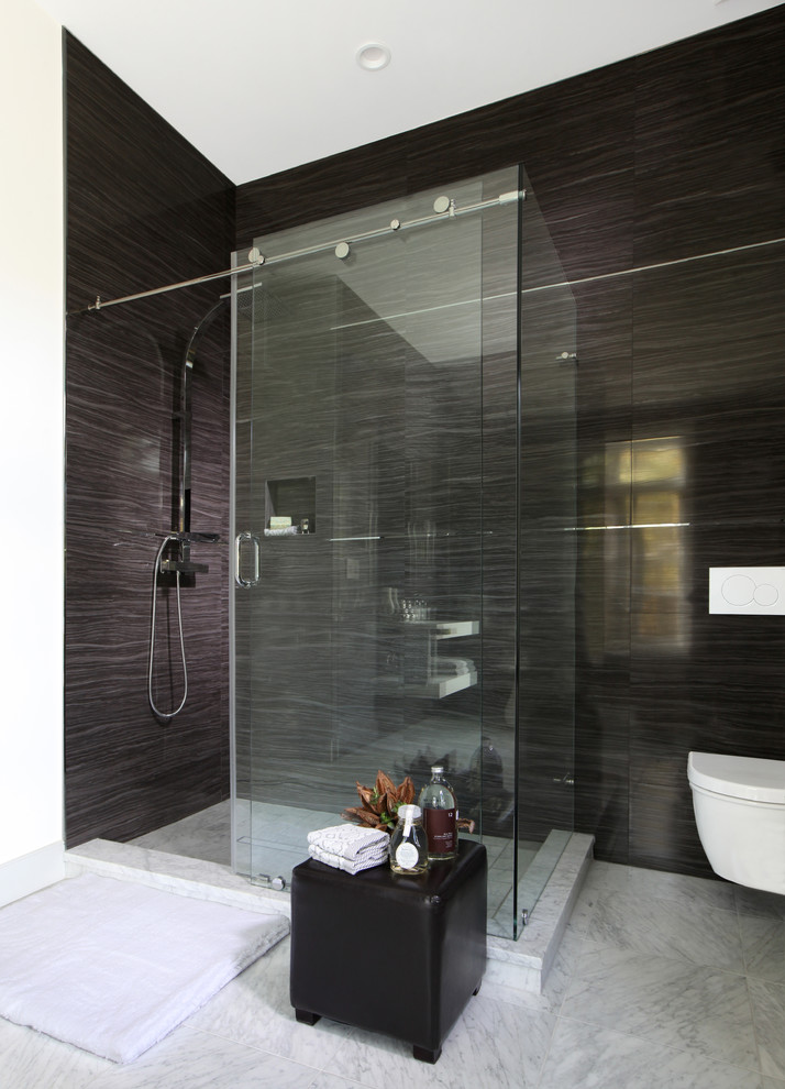 Expansive contemporary shower room bathroom in Other with a corner shower, black tiles, porcelain tiles, black walls, marble flooring, a wall-mounted sink, white floors and a sliding door.