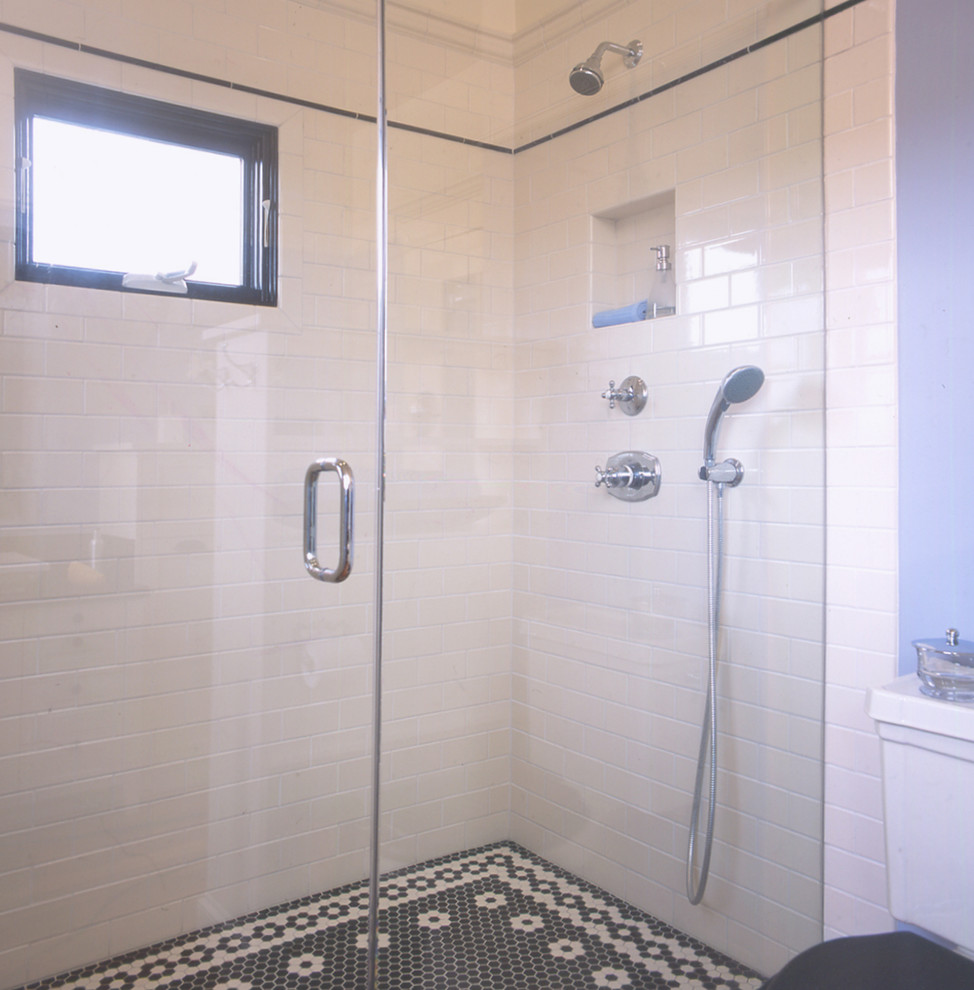 Example of a mid-sized arts and crafts white tile and subway tile dark wood floor alcove shower design in San Francisco with recessed-panel cabinets, white cabinets, a one-piece toilet, purple walls, a vessel sink and quartz countertops