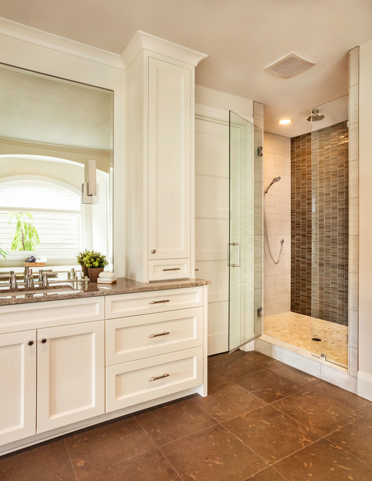 Transitional brown tile and mosaic tile brown floor alcove shower photo in Portland with an undermount sink, recessed-panel cabinets, white cabinets, beige walls and brown countertops