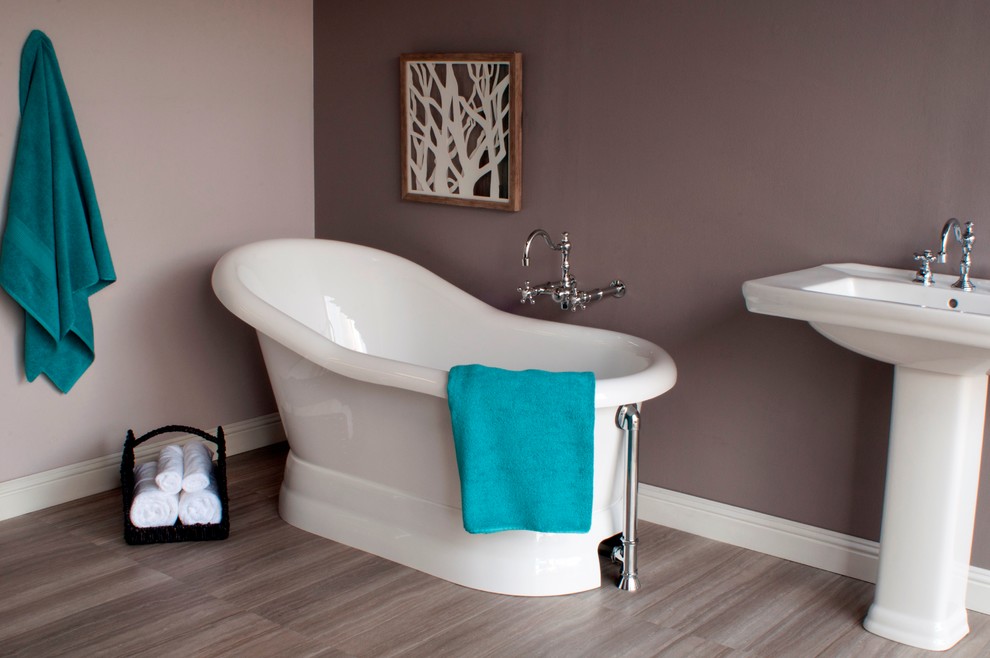 This is an example of a traditional bathroom in Sacramento with a freestanding bath.