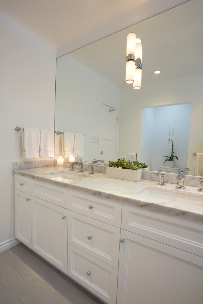 Large trendy master white tile and ceramic tile light wood floor bathroom photo in Los Angeles with an undermount sink, shaker cabinets, white cabinets, marble countertops, a two-piece toilet and white walls