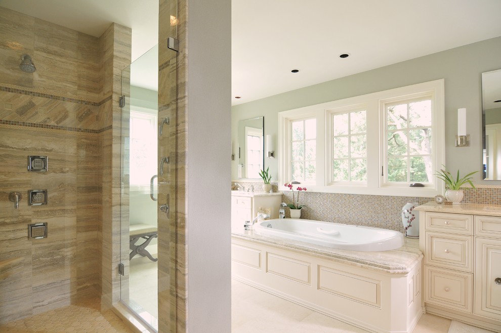 Esempio di una stanza da bagno contemporanea con ante con bugna sagomata, ante bianche, top in granito, vasca da incasso, doccia doppia, piastrelle bianche e piastrelle a mosaico