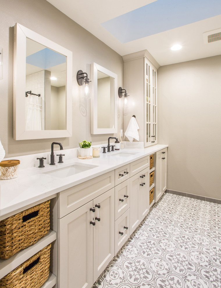 Inspiration for a mid-sized transitional kids' white tile and porcelain tile ceramic tile and gray floor bathroom remodel in Seattle with shaker cabinets, white cabinets, a one-piece toilet, beige walls, an undermount sink, quartz countertops and white countertops