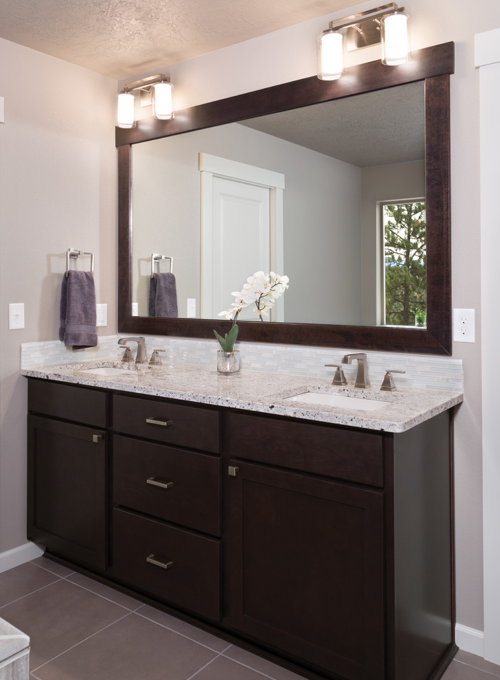 Inspiration for a modern bathroom in Other with shaker cabinets and dark wood cabinets.