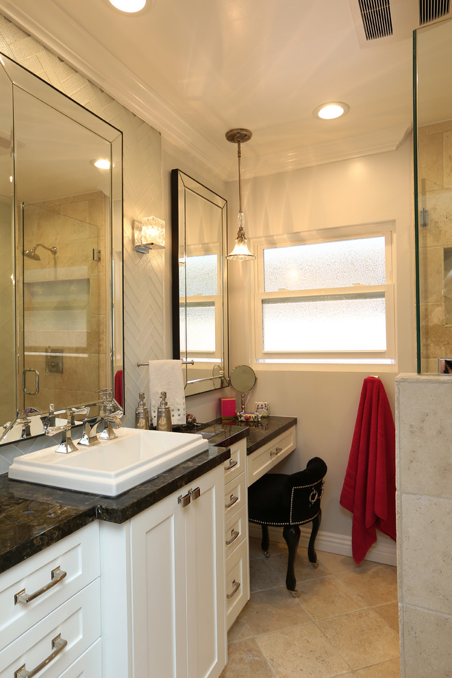 Photo of a medium sized modern ensuite bathroom in Los Angeles with white cabinets, beige tiles, white walls, shaker cabinets, limestone tiles, granite worktops, a double shower, a two-piece toilet, limestone flooring, a built-in sink, beige floors and a hinged door.