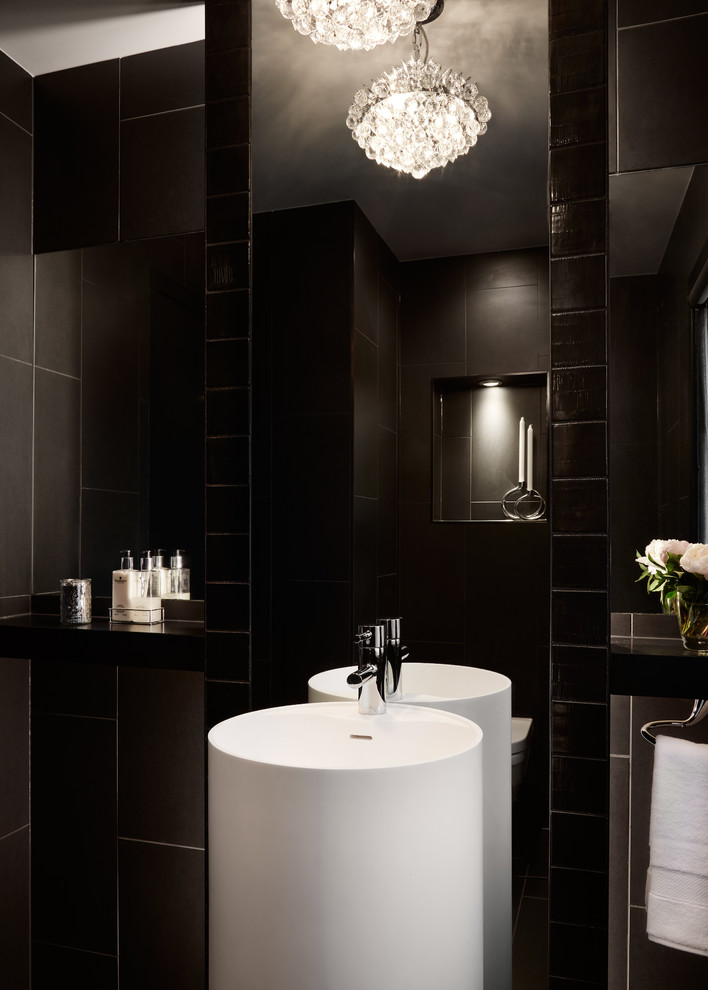 Photo of a small contemporary shower room bathroom in Chicago with open cabinets, a walk-in shower, black tiles, metro tiles, black walls, a pedestal sink and tiled worktops.