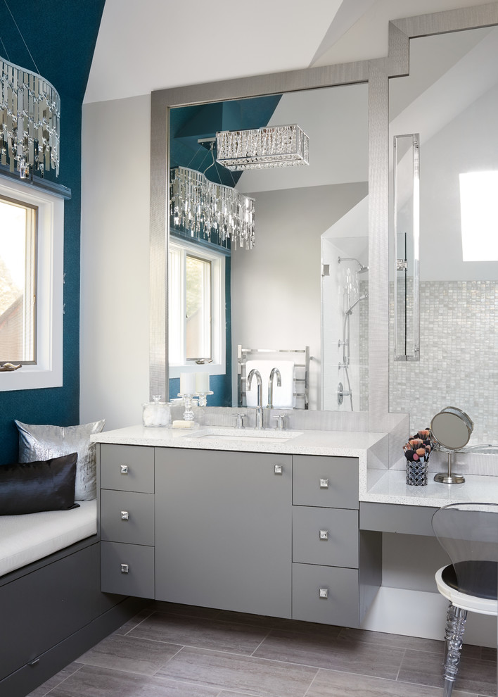 This is an example of a large contemporary ensuite bathroom in Chicago with flat-panel cabinets, grey cabinets, grey tiles, blue walls, a built-in sink, engineered stone worktops, stone tiles, an alcove shower and ceramic flooring.