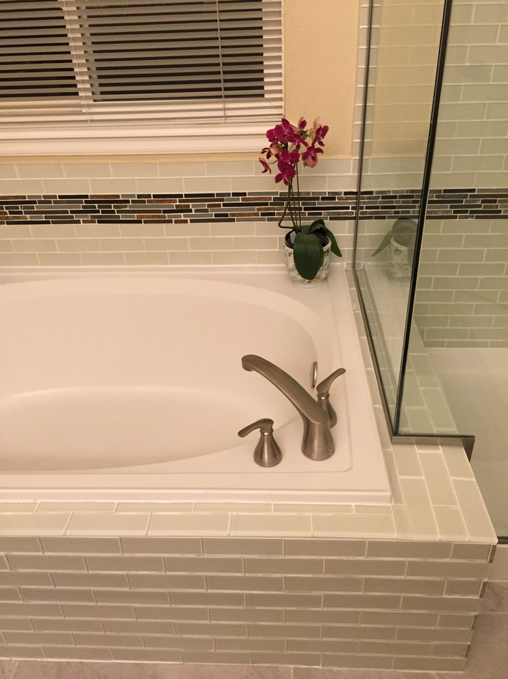Example of a mid-sized transitional master white tile and subway tile porcelain tile bathroom design in Denver with shaker cabinets, light wood cabinets, beige walls, a vessel sink and granite countertops