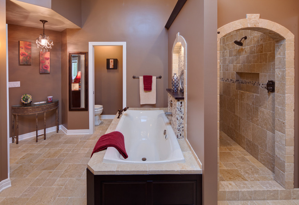 Inspiration for a mediterranean drop-in bathtub remodel in Chicago