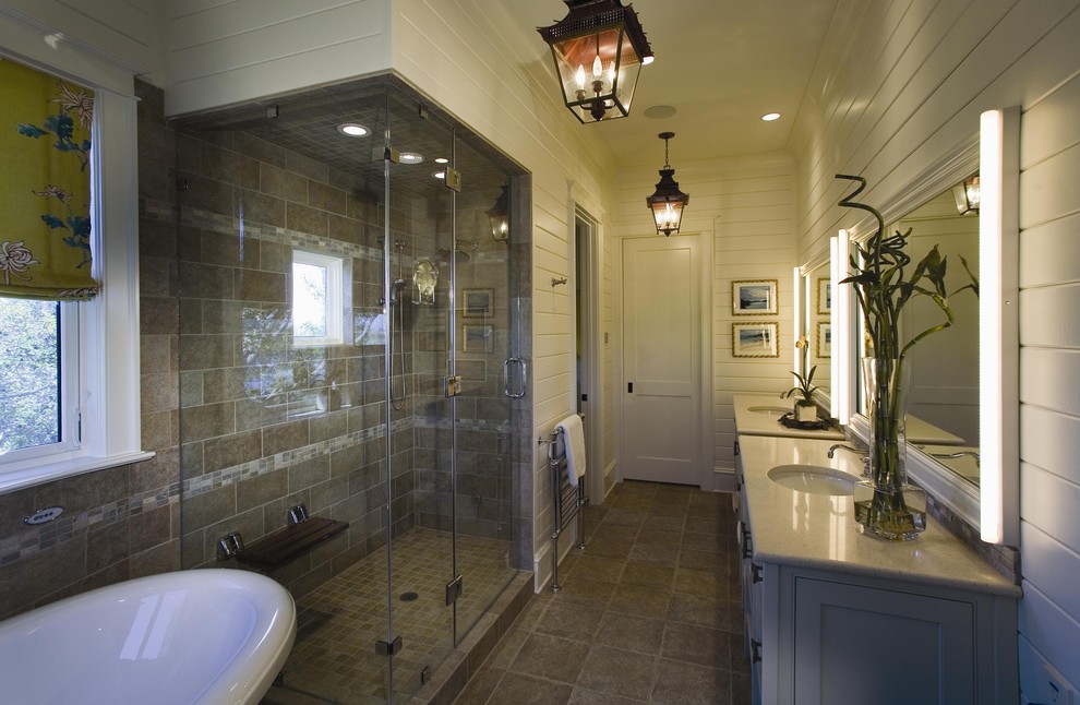 Inspiration for a large master claw-foot bathtub remodel in Charleston