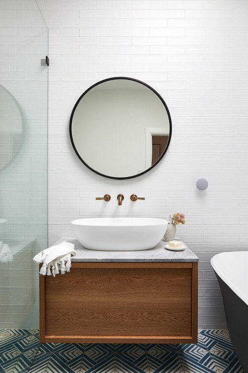 Patterned Floor Tiles with Single-sink Vanity and Marble Countertop