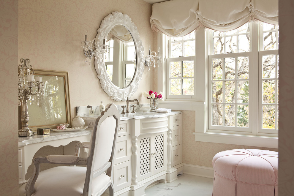 Inspiration for a large shabby-chic style master marble floor corner shower remodel in Minneapolis with furniture-like cabinets, white cabinets, marble countertops and pink walls