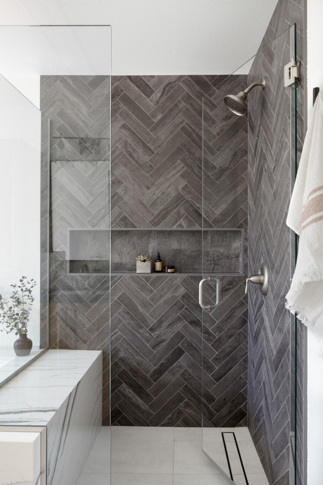 Design ideas for a classic bathroom in San Francisco with a corner shower, grey tiles, grey floors, a hinged door, a wall niche and a shower bench.