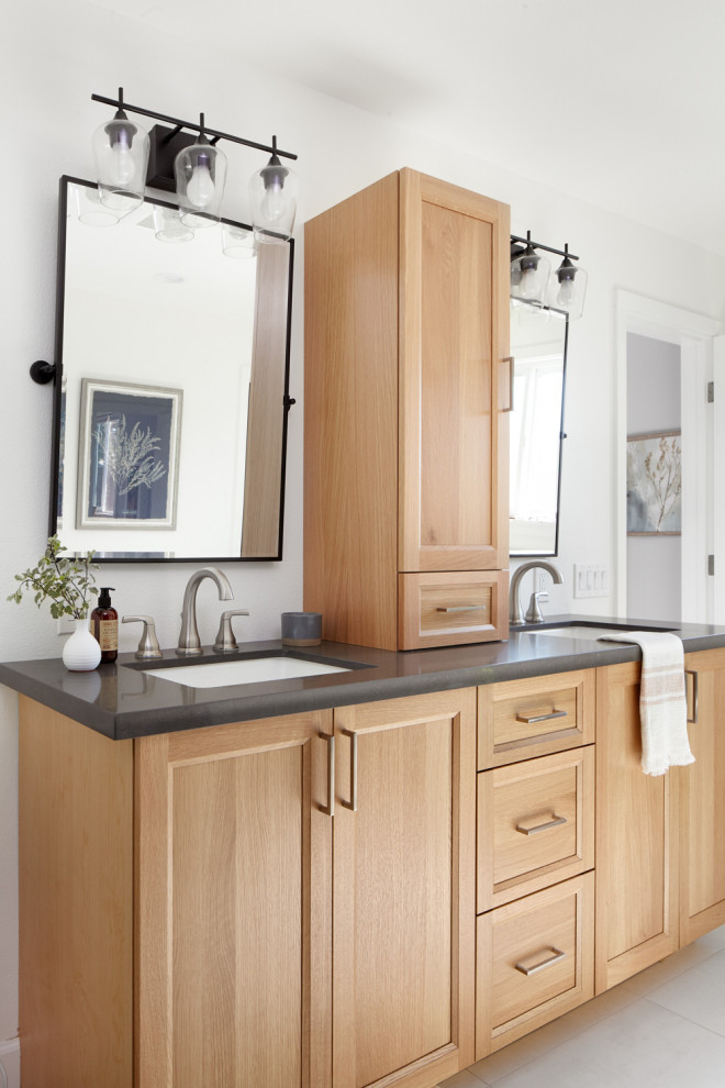Inspiration for a transitional gray floor and double-sink bathroom remodel in San Francisco with recessed-panel cabinets, medium tone wood cabinets, white walls, an undermount sink, gray countertops and a built-in vanity