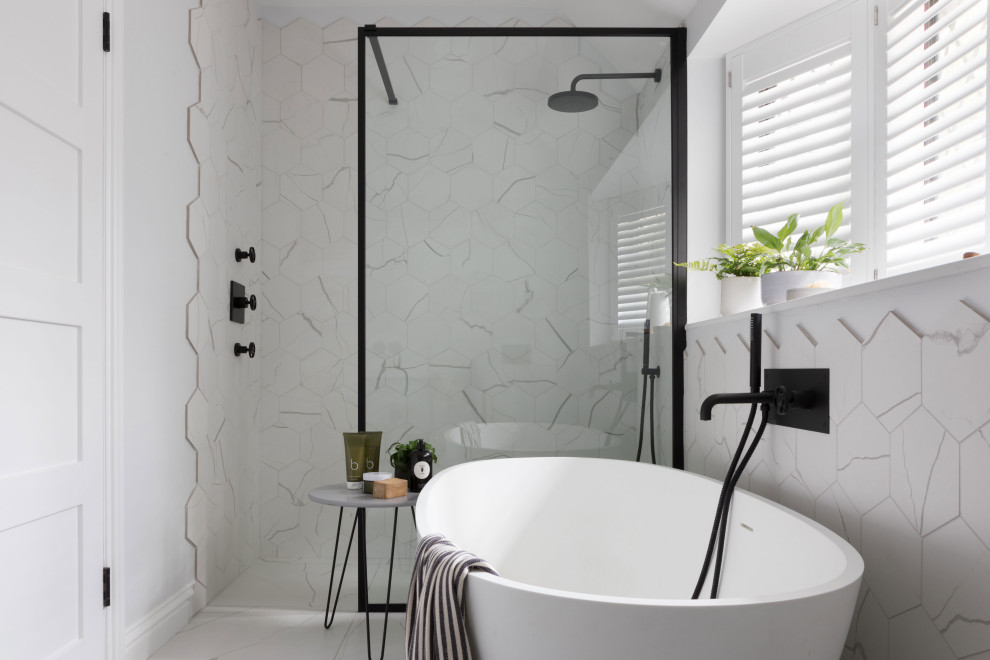 Design ideas for a small contemporary family bathroom in Sussex with a freestanding bath, porcelain tiles, an open shower, a built-in shower, white tiles and white floors.