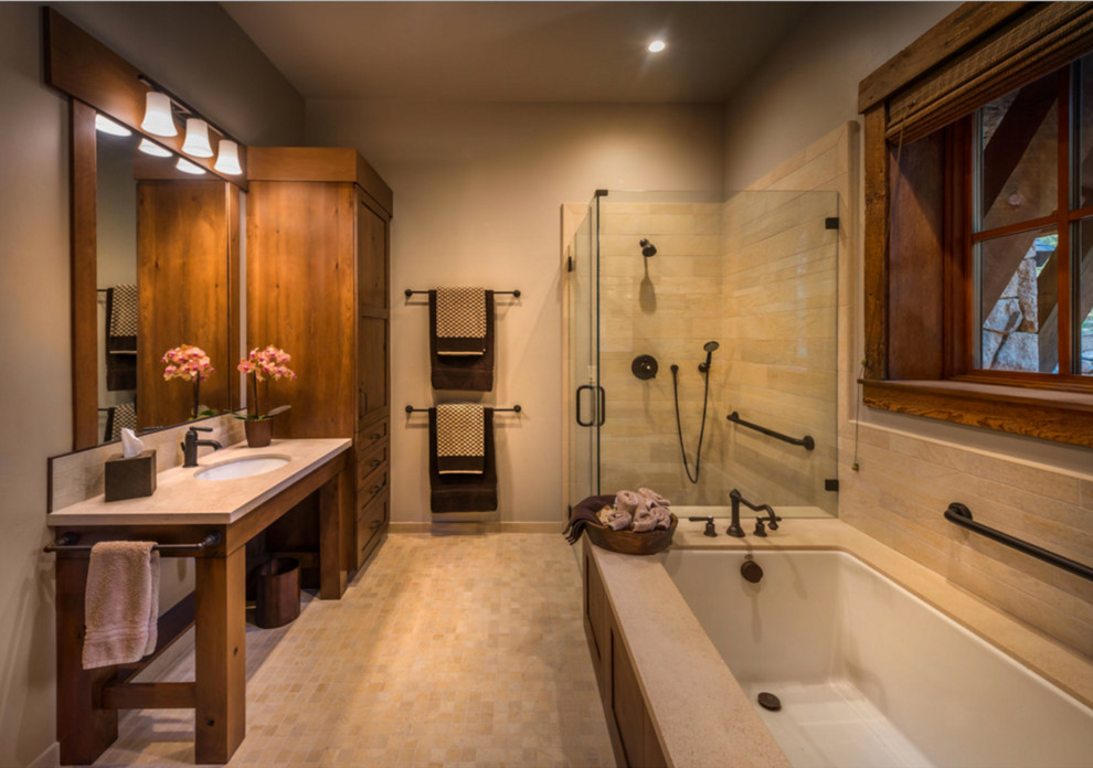 Imagen de cuarto de baño rural con bañera encastrada, ducha esquinera, lavabo bajoencimera y ducha con puerta con bisagras