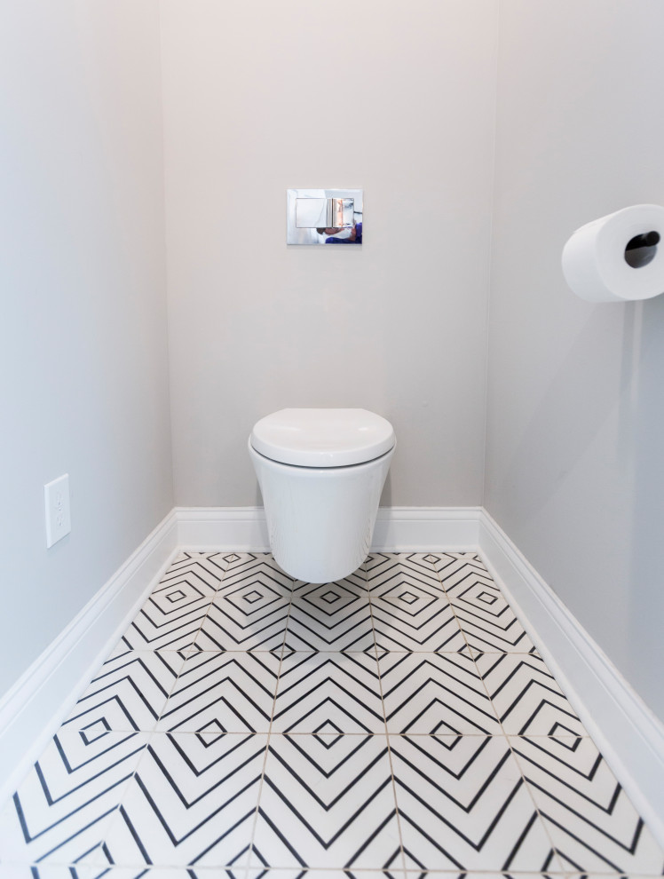 Idéer för ett mellanstort klassiskt svart en-suite badrum, med möbel-liknande, skåp i mellenmörkt trä, en dubbeldusch, en vägghängd toalettstol, vit kakel, grå väggar, cementgolv, ett avlångt handfat, granitbänkskiva, flerfärgat golv och med dusch som är öppen