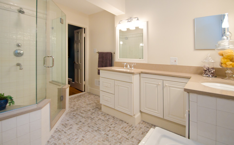 Mid-sized elegant 3/4 white tile and marble tile marble floor and gray floor corner shower photo in DC Metro with raised-panel cabinets, white cabinets, a two-piece toilet, gray walls, an undermount sink, marble countertops and a hinged shower door