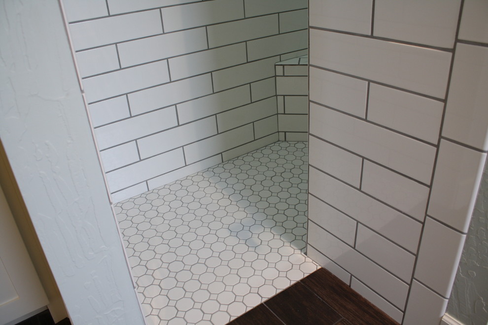 Mid-sized arts and crafts master white tile and subway tile ceramic tile bathroom photo in Oklahoma City with shaker cabinets, white cabinets, a two-piece toilet, gray walls, an undermount sink and marble countertops