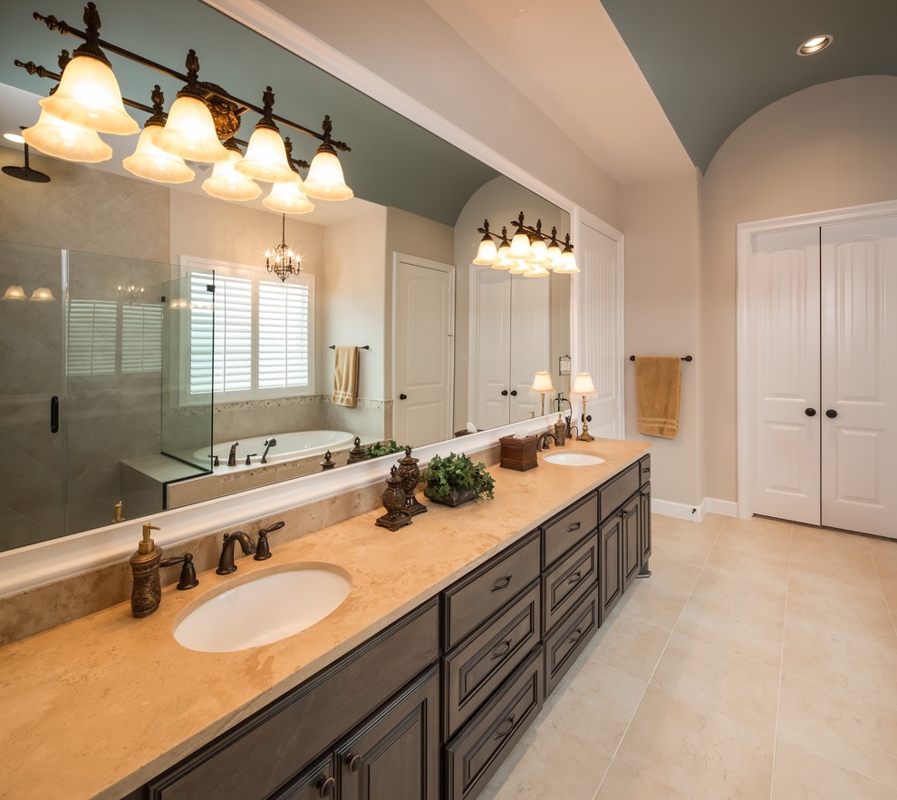 Example of a mid-sized classic master white tile and porcelain tile ceramic tile bathroom design in Houston with an undermount sink, furniture-like cabinets, dark wood cabinets and beige walls