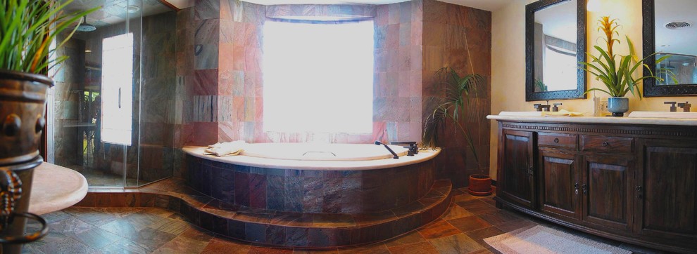 Idée de décoration pour une salle de bain principale design en bois foncé de taille moyenne avec un placard en trompe-l'oeil, une baignoire posée, une douche d'angle, un carrelage rouge, du carrelage en ardoise, un mur jaune, un sol en ardoise, un lavabo posé, un plan de toilette en calcaire, un sol rouge et une cabine de douche à porte battante.